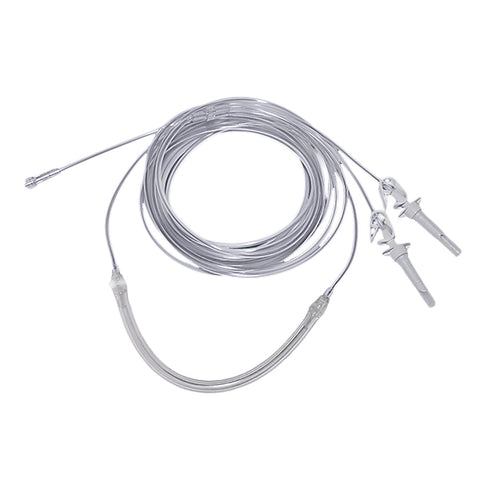 A coiled, clear, flexible infiltration tubing with metal spikes and a luer lock fitting, used for medical procedures such as liposuction.